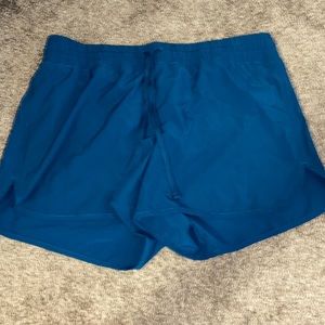 Teal running shorts